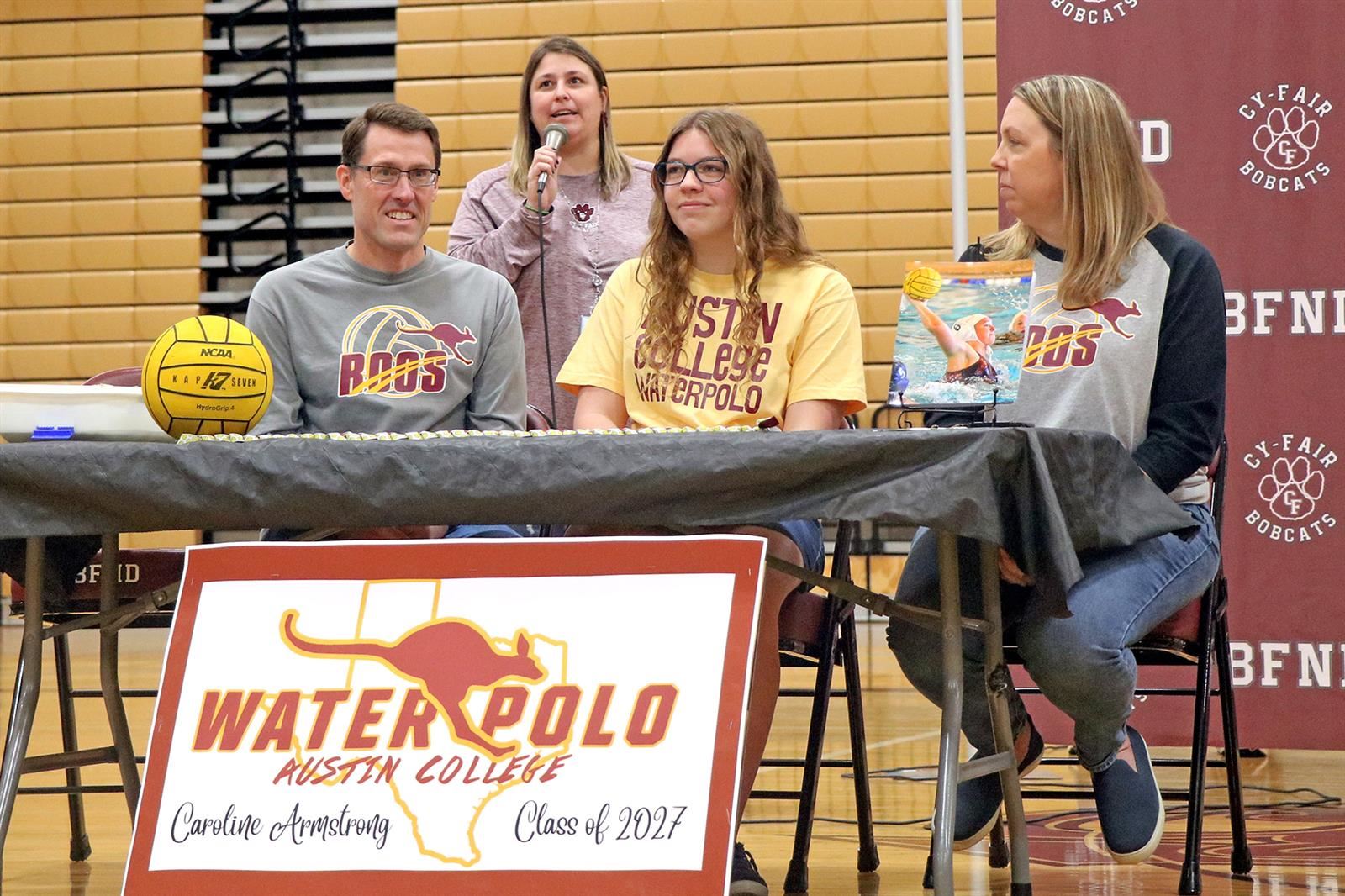 Cy-Fair High School senior Caroline Armstrong, seated center, signed a letter of intent to Austin College.